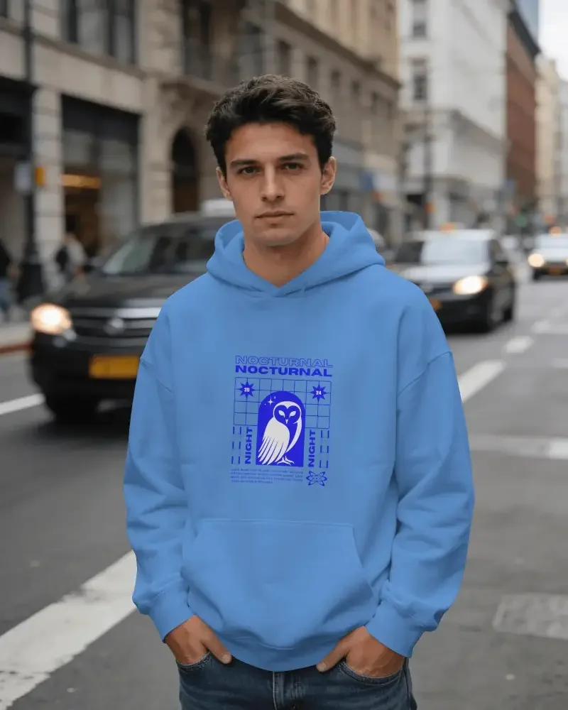 Model wearing a blue graphic hoodie