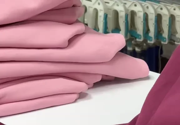 Folded pink garments